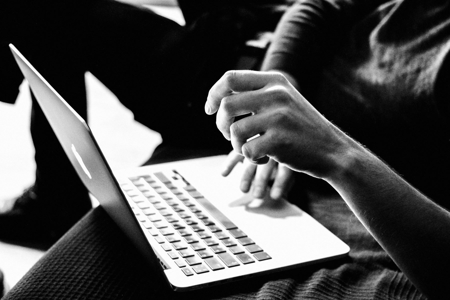 Christian Miller at work on a laptop